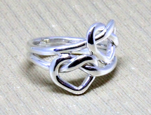 Silver ring with two intertwined hearts (code AN.AG.70)